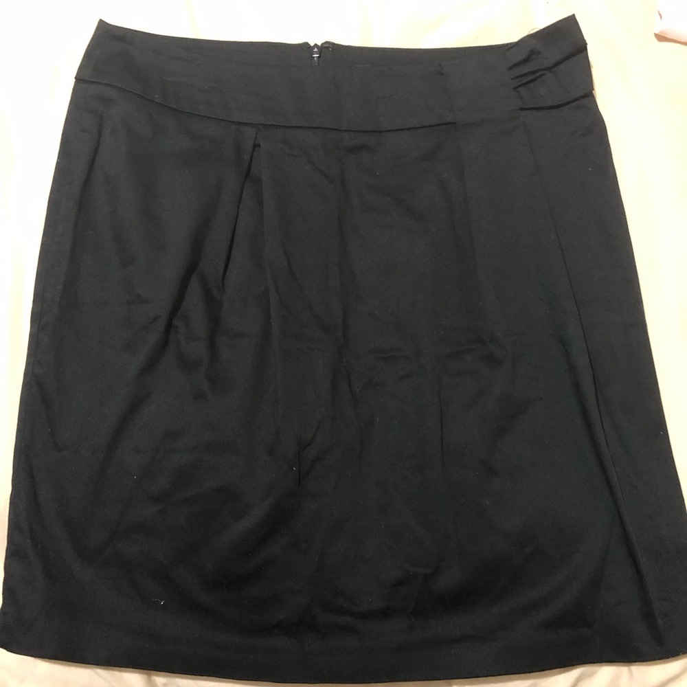 Knee length black skirt